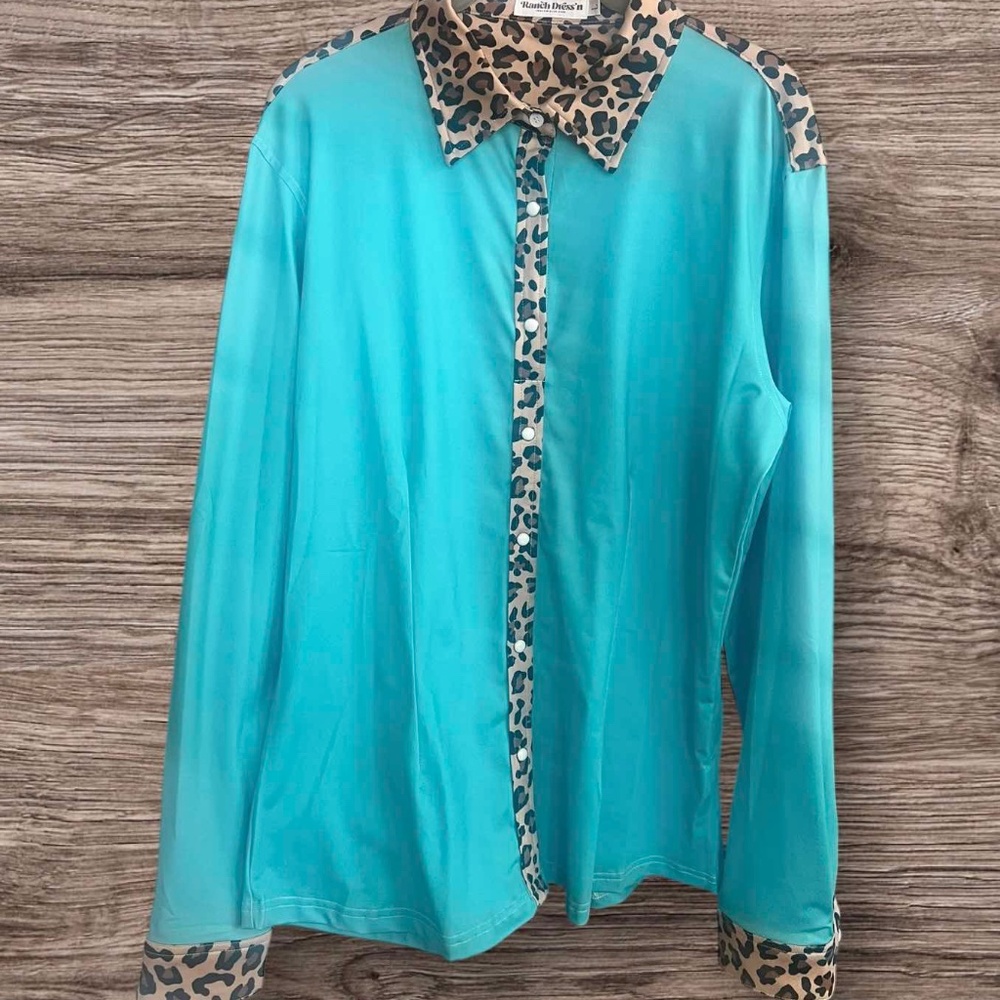 NWOT Ranch Dress'n LEOPARD AND TURQ PERFORMANCE RODEO SHIRT Size Large SOLD OUT